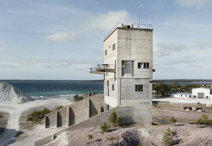 Former limestone works converted into a hotel, standing on flat quarry ground